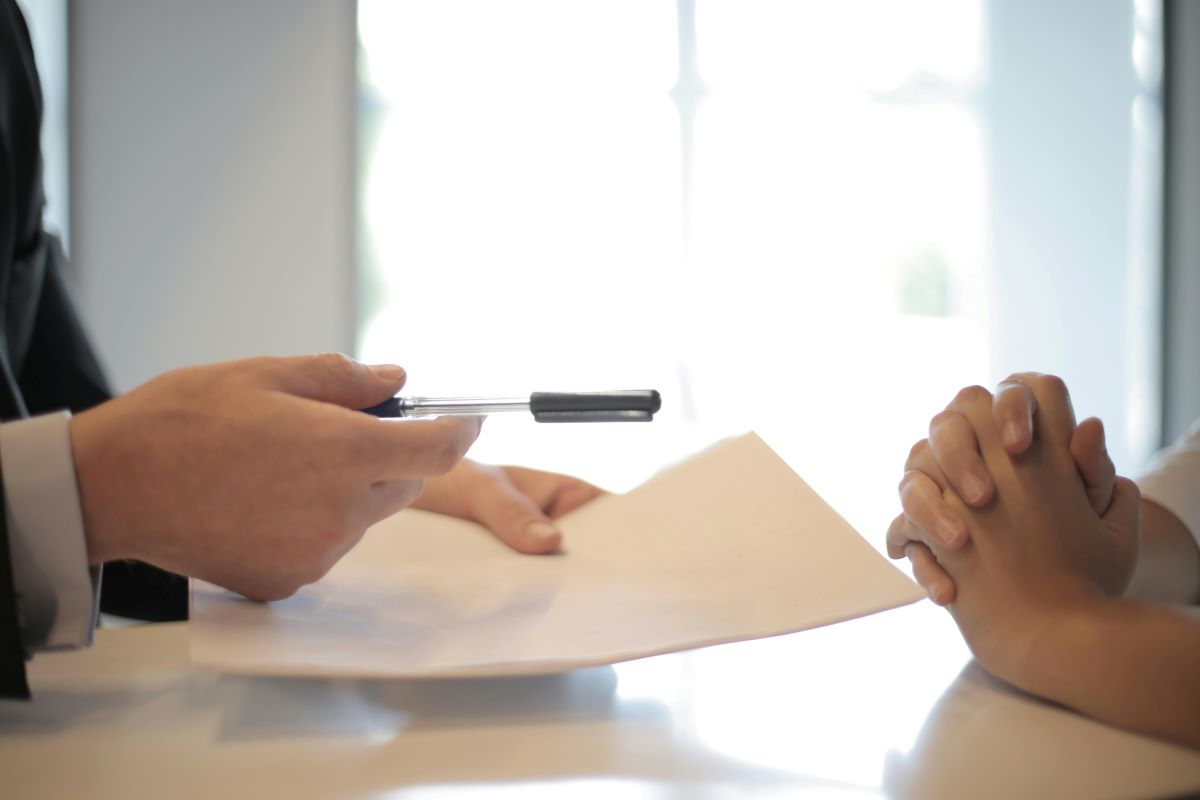 Two people talking over a table
