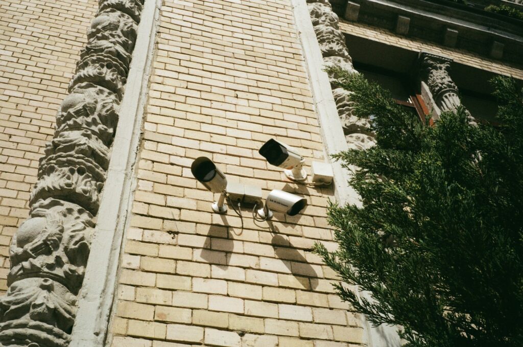 Security cameras mounted on a wall